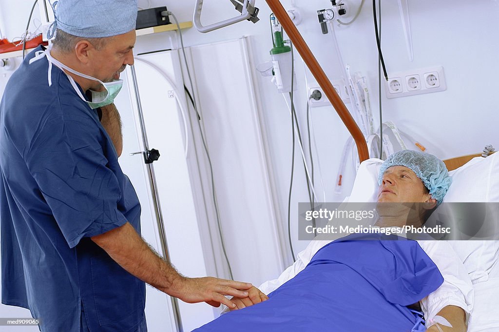 Surgeon reassuring patient