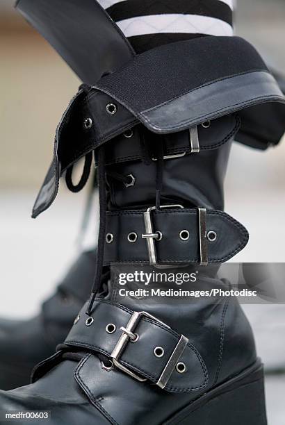 close-up of buckle up leather boots - schnalle stock-fotos und bilder
