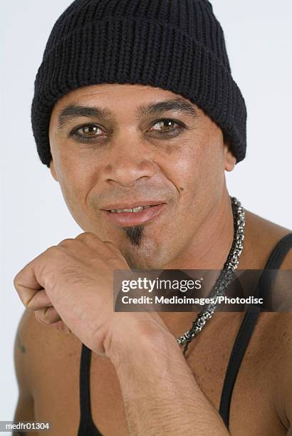 close-up of a young man with a raised fist - soul patch stock pictures, royalty-free photos & images