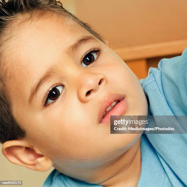 portrait of four year old boy, close-up, part of, tilt - year on year stock pictures, royalty-free photos & images