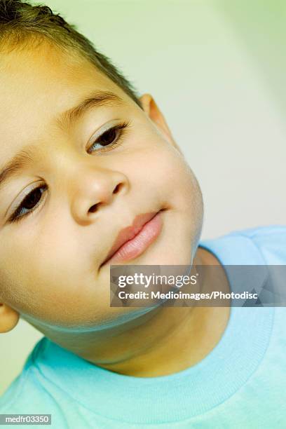 portrait of four year old boy, close-up, part of, tilt - year on year stock pictures, royalty-free photos & images