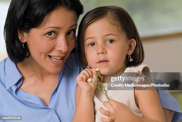 portrait of mother and four year old daughter, close-up - year on year stock pictures, royalty-free photos & images