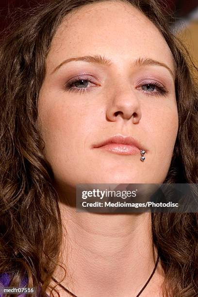 young woman with pierced lip, close-up - finger waves stock pictures, royalty-free photos & images