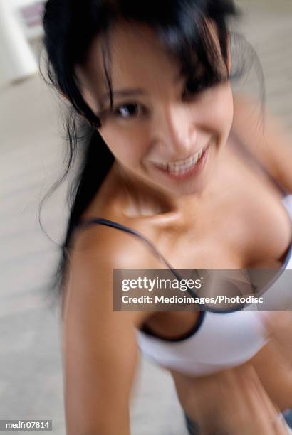 young woman in sports bra, close-up, defocused, high angle view - wonky fringe stock pictures, royalty-free photos & images