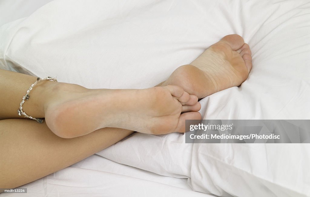 Woman lying on the bed