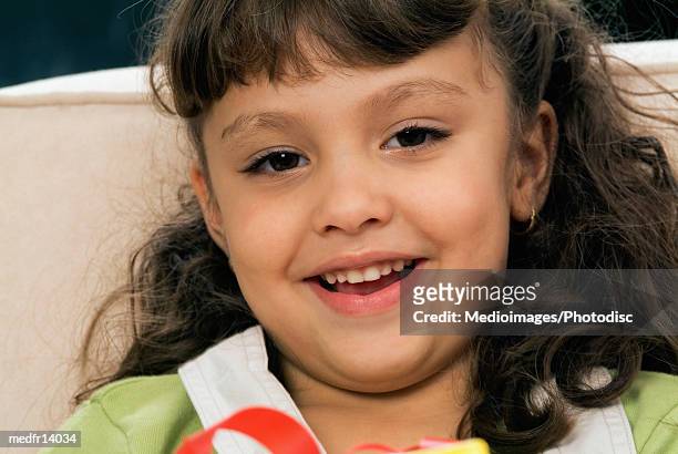 portrait of smiling five year old girl, close-up - year on year stock pictures, royalty-free photos & images