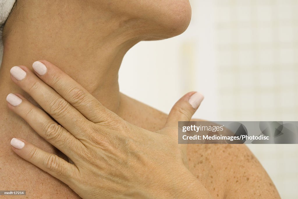 Woman massage her neck