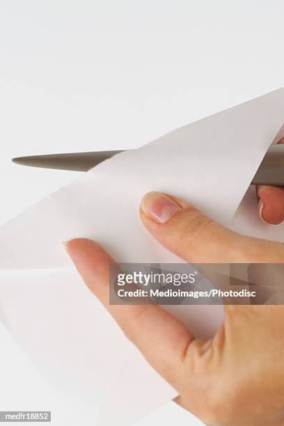 person opening letter with letter opener, close-up - letter opener stock pictures, royalty-free photos & images