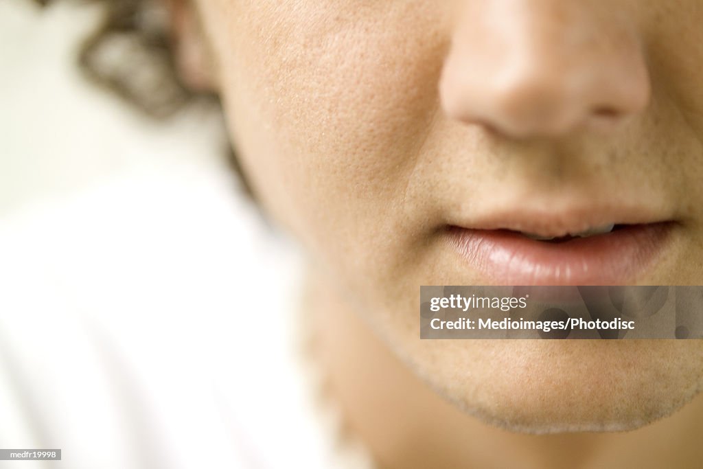 Close-up of a young man's nose and mouth