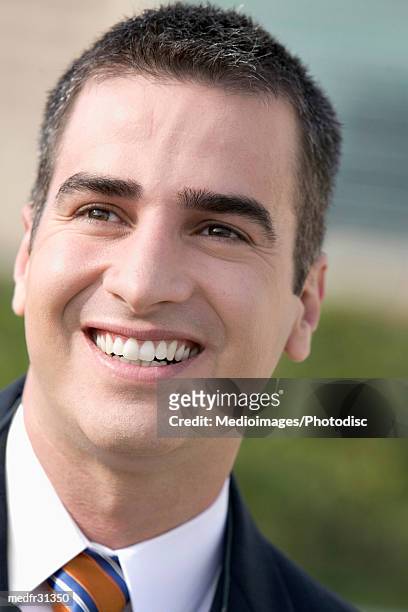 smiling businessman outdoors, close-up - crew cut stock pictures, royalty-free photos & images