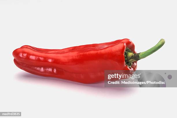 red pepper on counter with pepper stem up, close-up, tilt - close up counter ストックフォトと画像