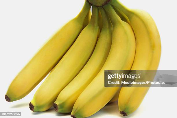 bunch of bananas on counter, close-up - close up counter ストックフォトと画像