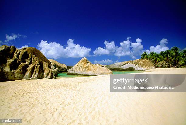 boulders on gorda bay beach in british virgin islands, caribbean - bay islands stock pictures, royalty-free photos & images