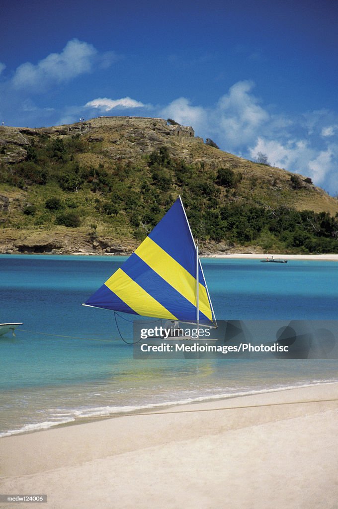 Sunfish boat and Deep Bay Beach on Antigua, Caribbean