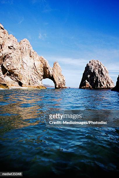 mexico, baja california, cabo san lucas, land's end arch, view of rock formation in the ocean - world premiere of the end of longing written by and starring matthew perry stockfoto's en -beelden