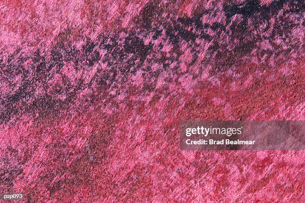 mottled red-violet background - red rock formation stock illustrations