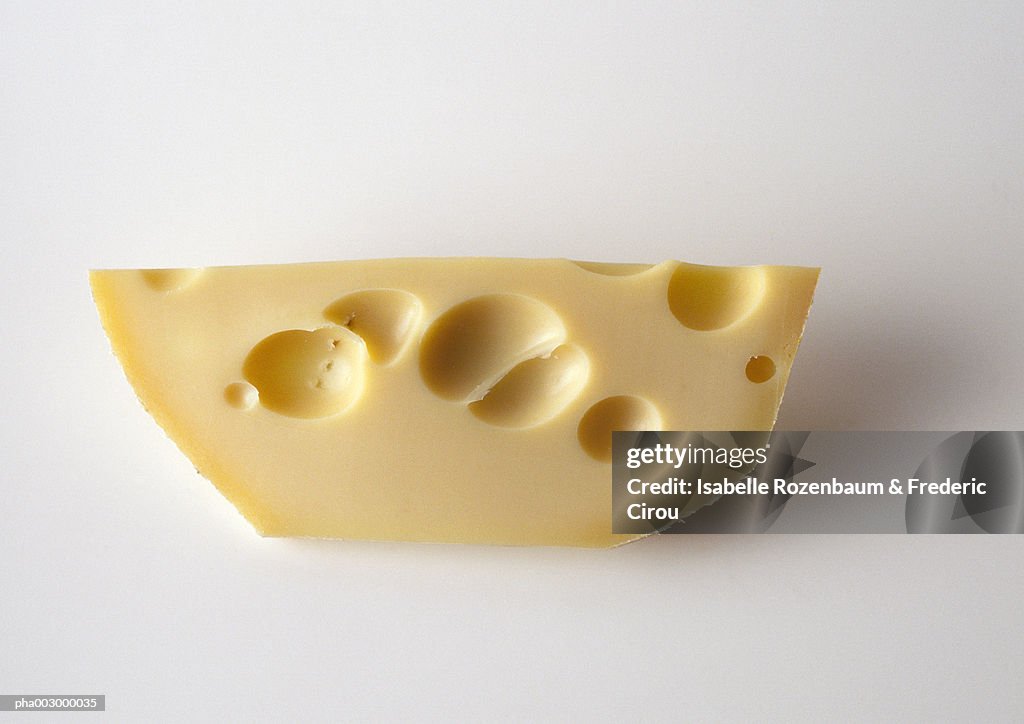 Piece of swiss cheese, close-up