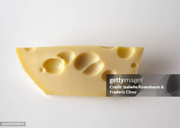 piece of swiss cheese, close-up - the center stock pictures, royalty-free photos & images