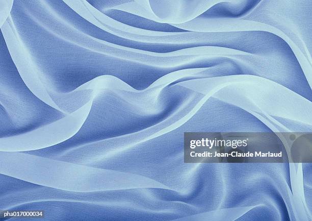 folds in silky fabric, full frame - chiffon stockfoto's en -beelden