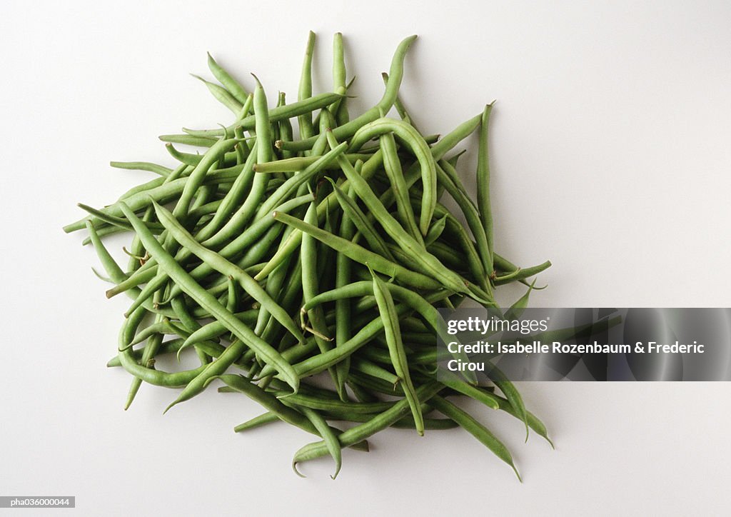 Pile of string beans, white background