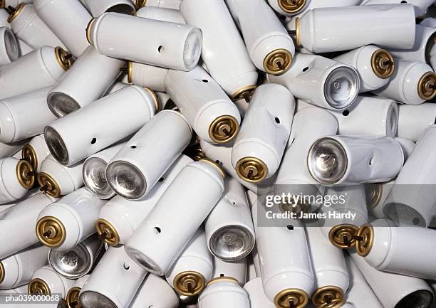 heap of white, punctured aerosol cans, close-up - aerosol stock pictures, royalty-free photos & images