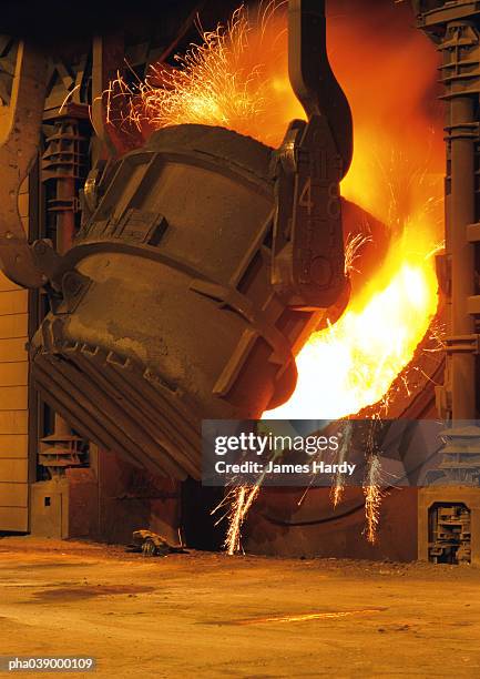 steel factory, cast iron smelting, sparks flying - sparks bildbanksfoton och bilder