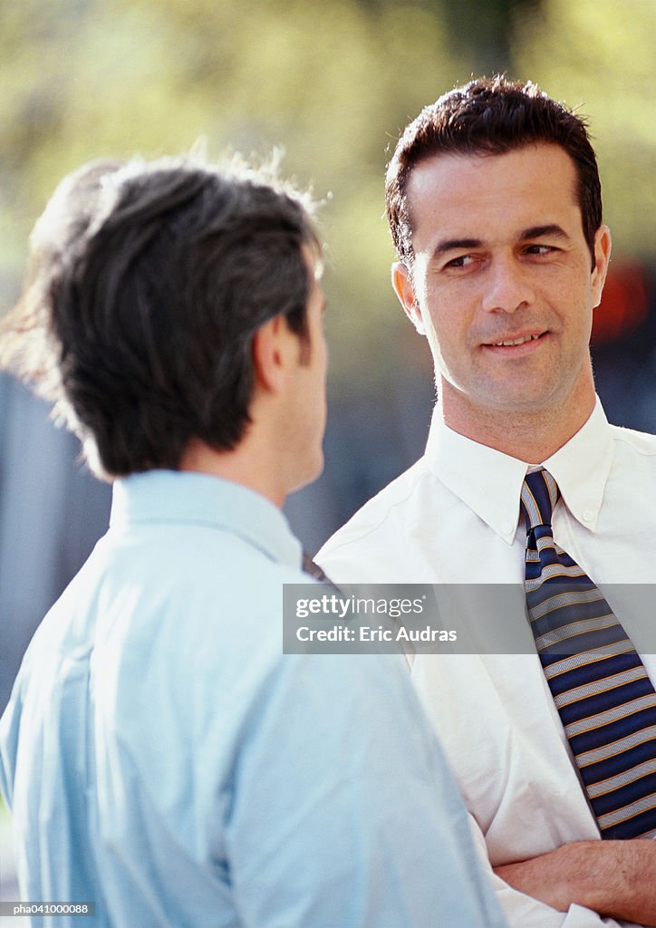 Two businessmen outside