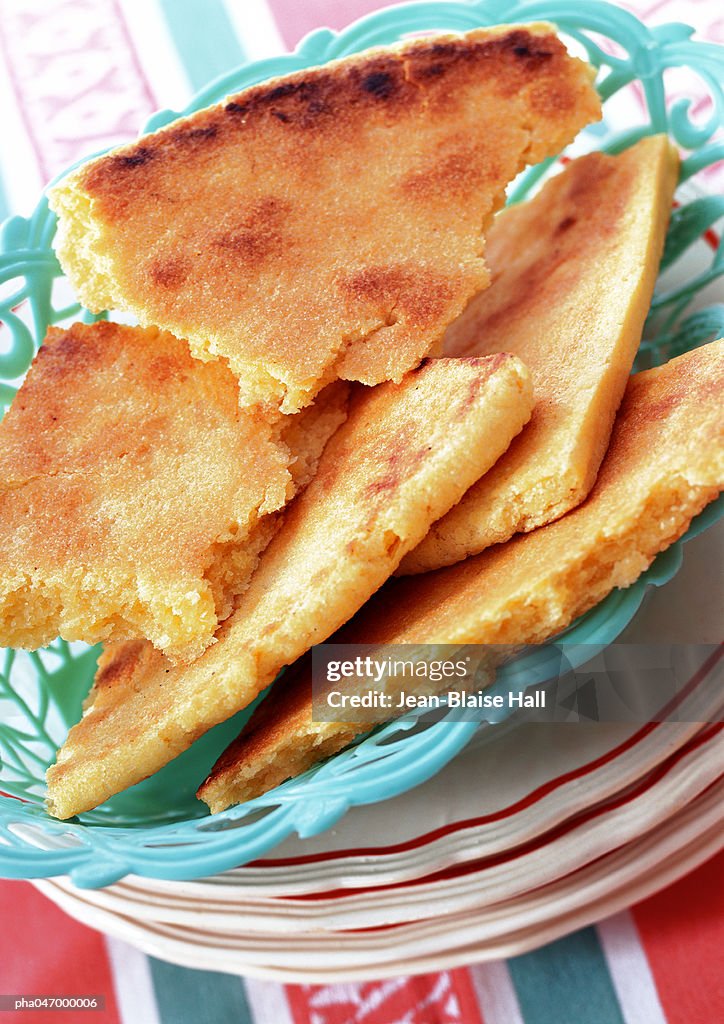 Basket of algerian bread broken into pieces, close-up