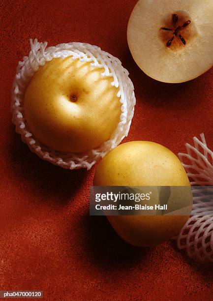asian pears, one in cross section, high angle view, close-up - high up ストックフォトと画像