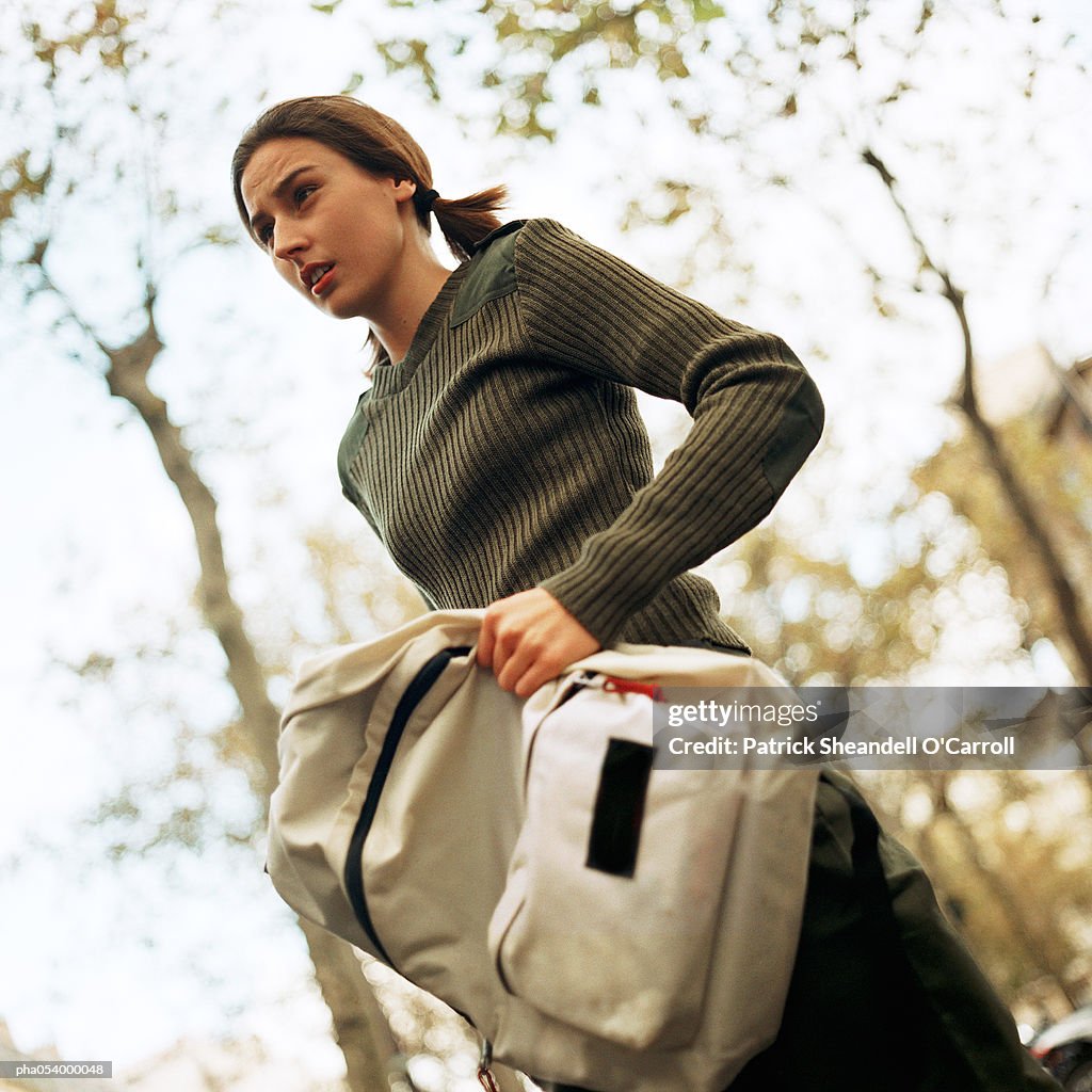 Female teenager with backpack