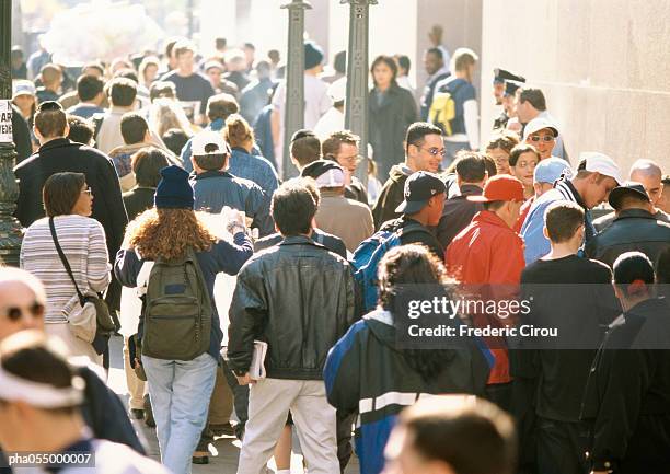 crowds walking and lingering, urban setting - lingering stock pictures, royalty-free photos & images