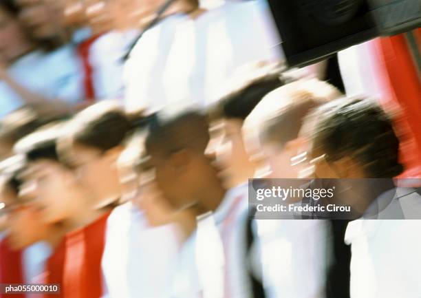 group of people forming a line, head and shoulders, blurred - chorale stock pictures, royalty-free photos & images