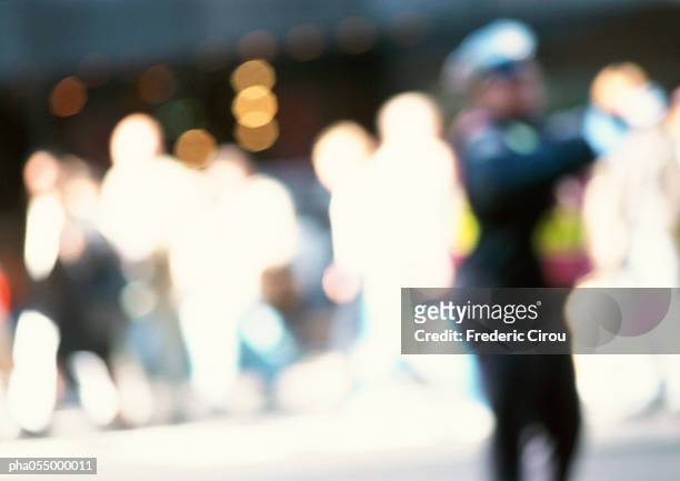 silhouettes of people in street, blurred - intersected stock pictures, royalty-free photos & images