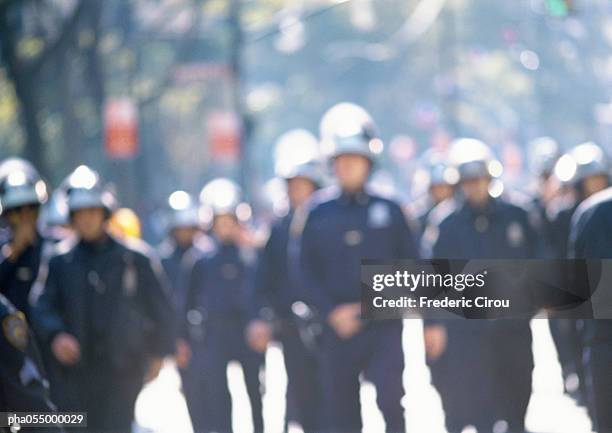 riot police, blurred - riot stock-fotos und bilder