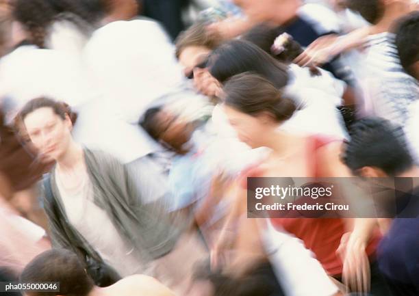 crowd of people walking, blurred - africain stockfoto's en -beelden