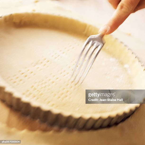 preparing pie crust, blurry. - crostata di frutta foto e immagini stock