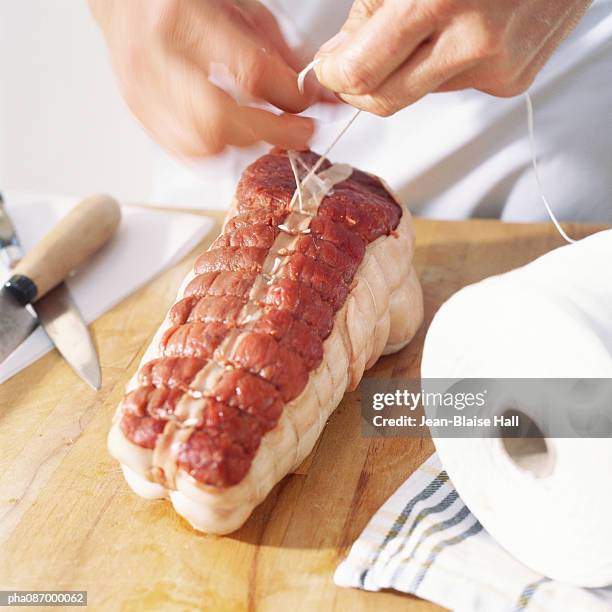 close-up of meat being prepared. - roast beef stock pictures, royalty-free photos & images