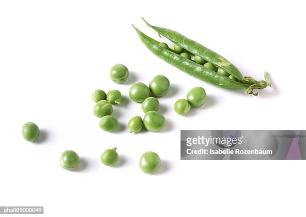 peas and pea pod, close-up - green pea stock pictures, royalty-free photos & images