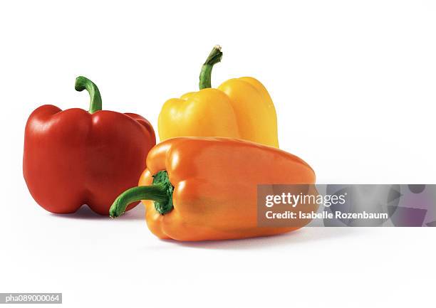 assortment of bell peppers, close-up - oranje paprika stockfoto's en -beelden