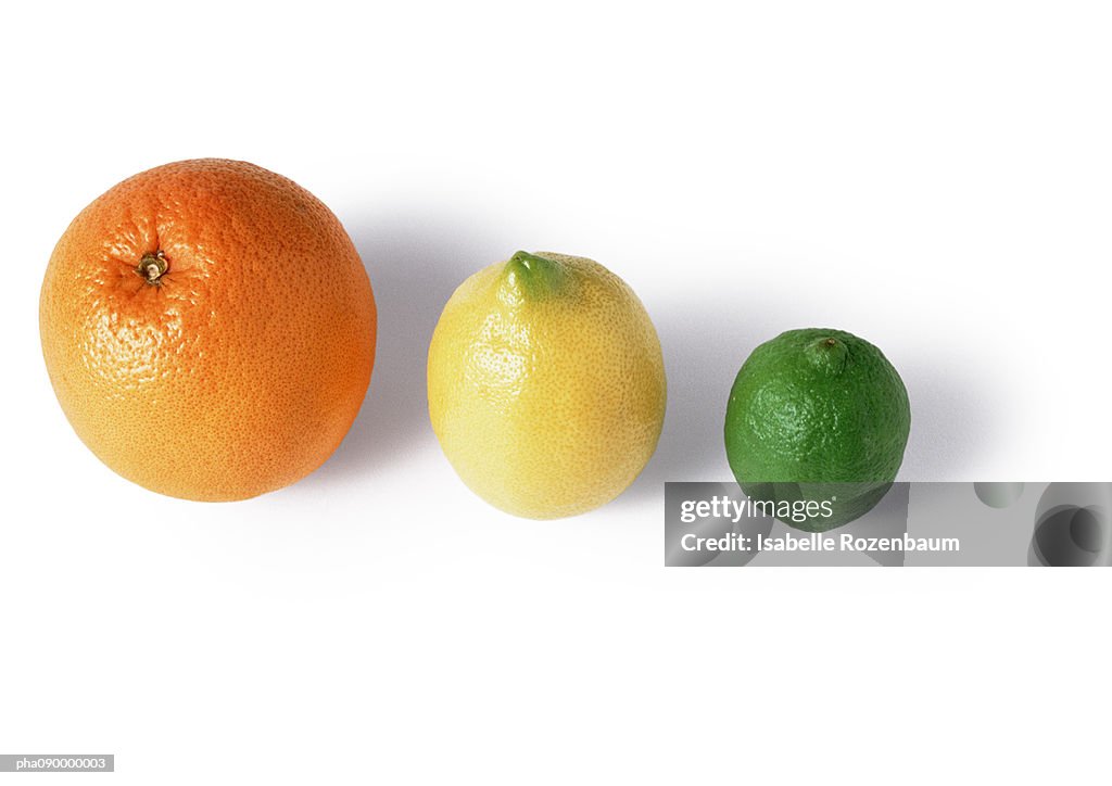 Orange, lemon and lime, white background