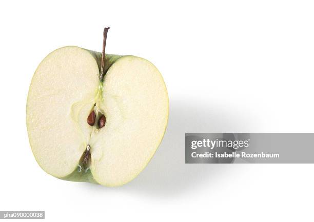 half an apple, white background - apple slice stock pictures, royalty-free photos & images