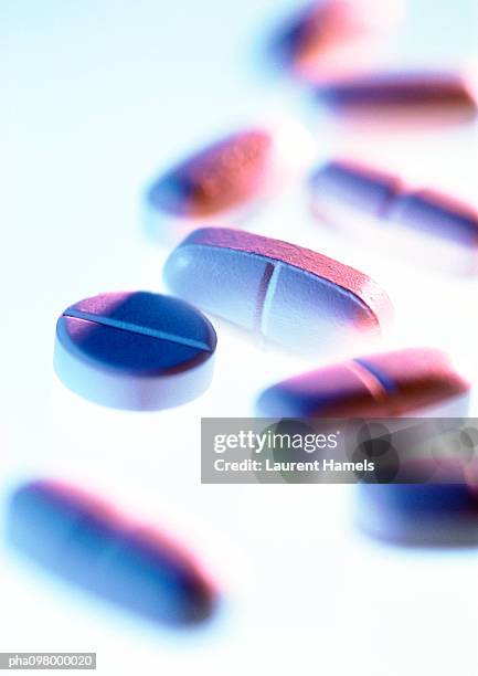 a variety of medicine tablets, close-up, blurred - variety fotografías e imágenes de stock