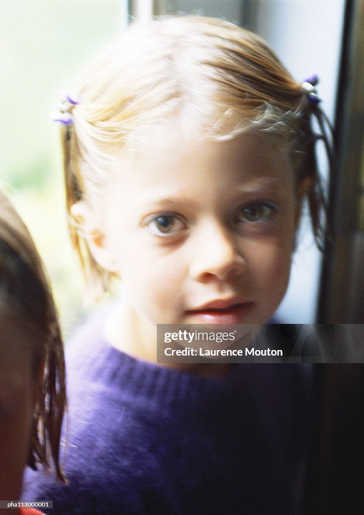 Girl looking into camera, portrait