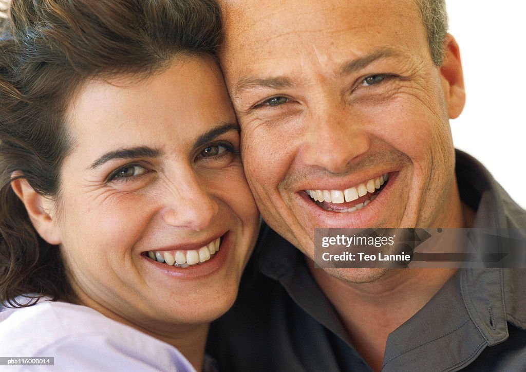 Couple smiling, close-up