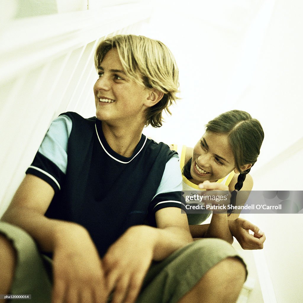 Two teenagers smiling