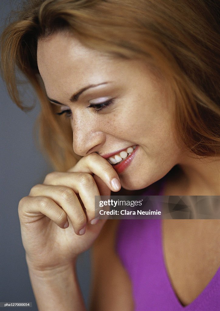 Woman smiling, close-up