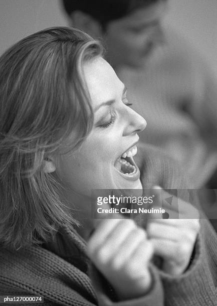woman opening mouth, close-up, b&w - the opening day of goodwood races march 24 2004 stockfoto's en -beelden