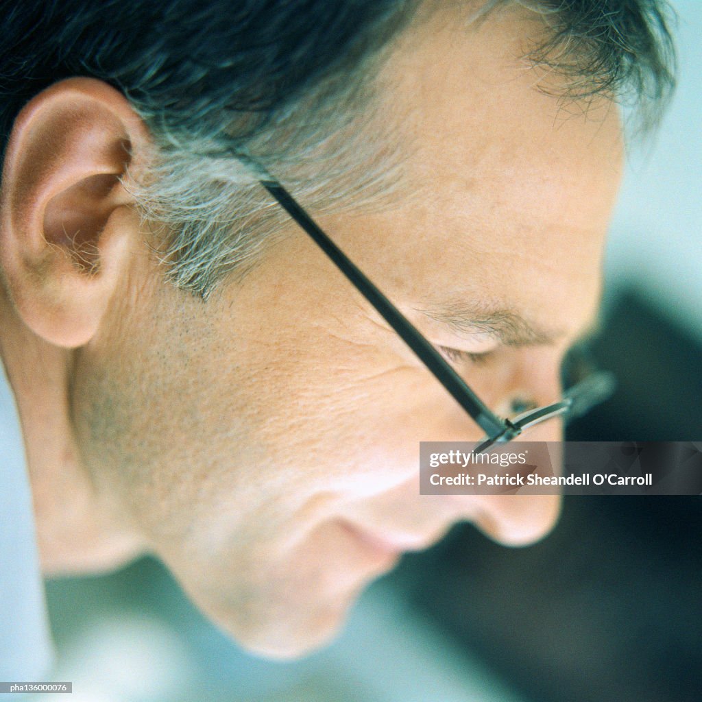 Profile of senior man wearing glasses