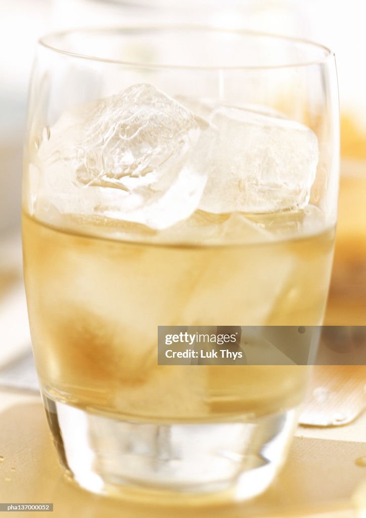 Whiskey with ice cubes.