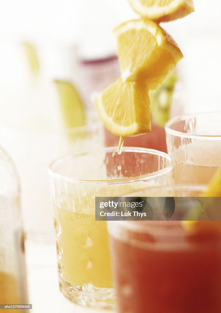 Cocktails with orange slices, close-up.